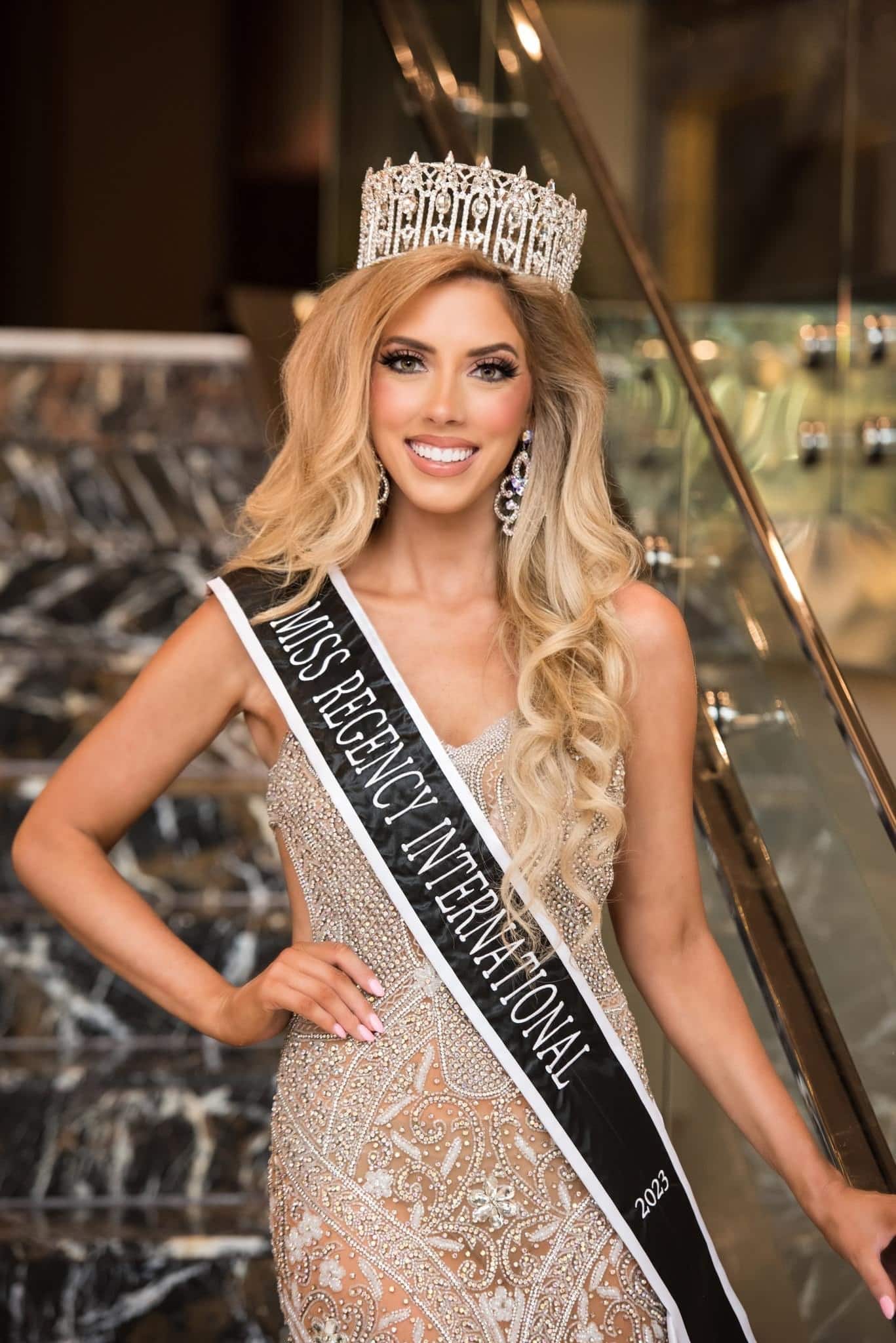 Miss Regency International winner with crown and sash