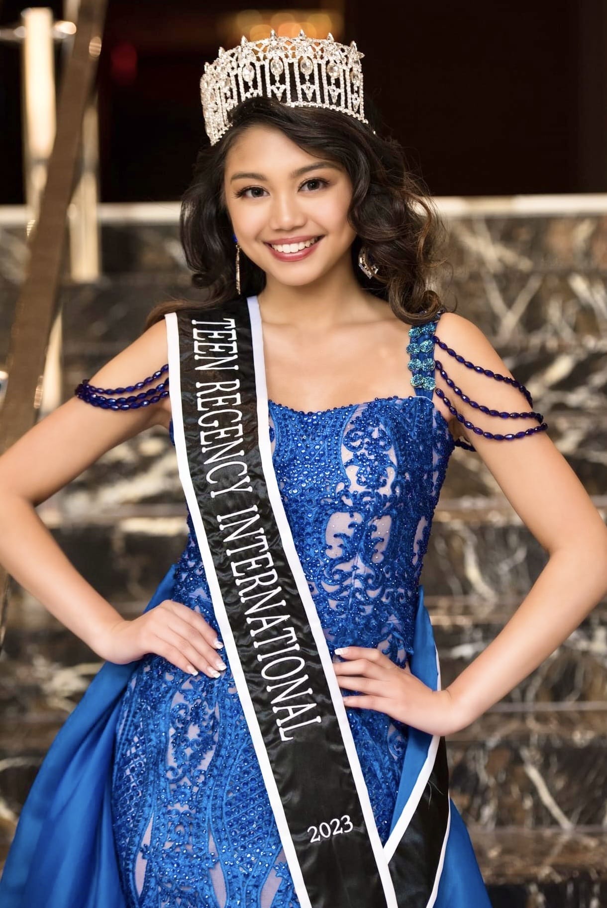 Teen Regency International 2023 winner in blue gown.